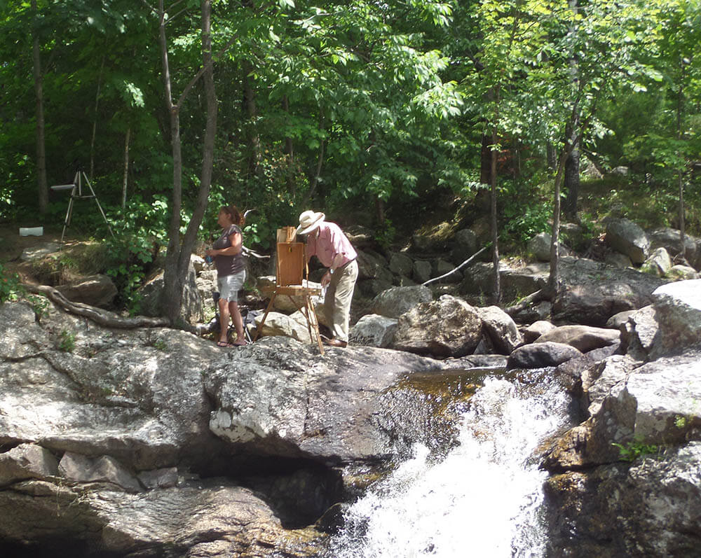 Plein air painting near a rushing Maine stream - Brush Cleaner for Painters and Other Painting Tips from The Brush Butler